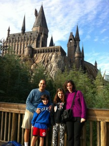 Our family poses in front of Hogwarts